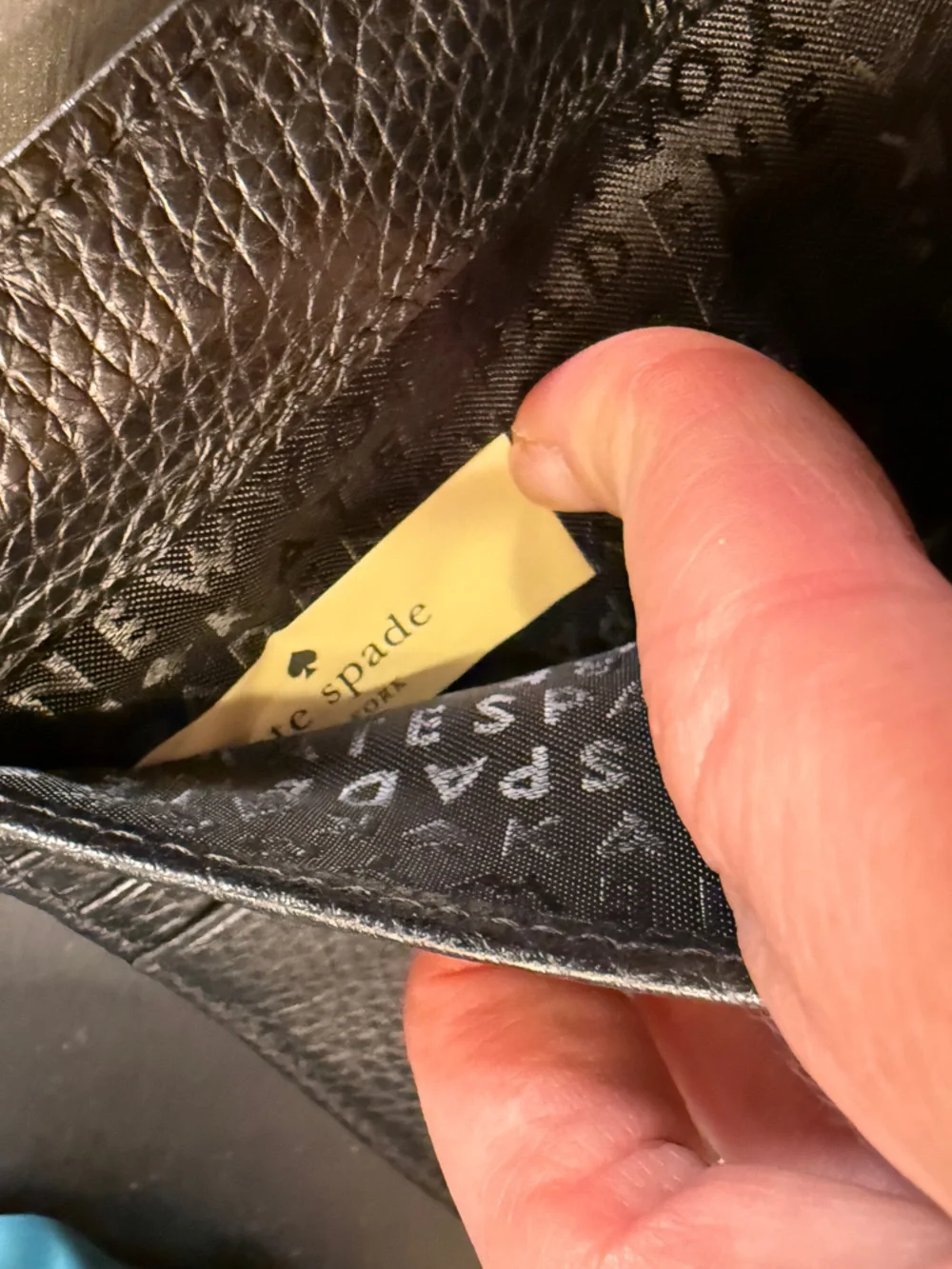 Kate Spade Black Pebbled Leather Tri Fold Wallet with Gold-Tone Logo Closure